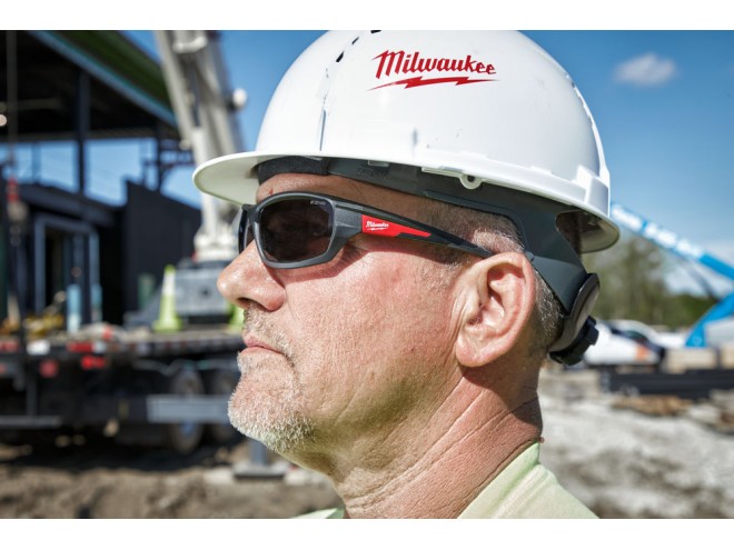 Performance Tinted Safety Glasses. OEM. Part No. 4932471884. Milwaukee PPE. Milwaukee safety glasses. Milwaukee products. Hand tools, power tools. Milwaukee range. Startin Tractors Milwaukee stockist. Click & Collect.