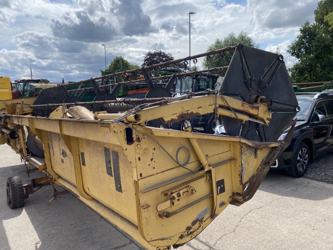 NewHollandTX 34 C/W 20' Header and trailer
