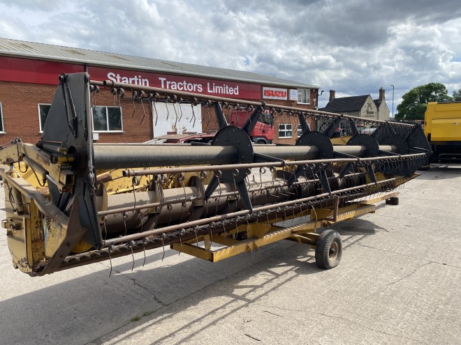 NewHollandTX 34 C/W 20' Header and trailer