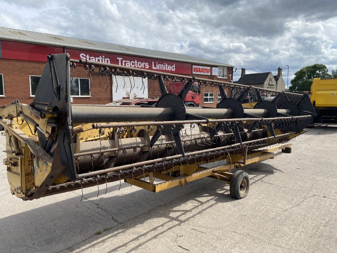 NewHollandTX 34 C/W 20' Header and trailer