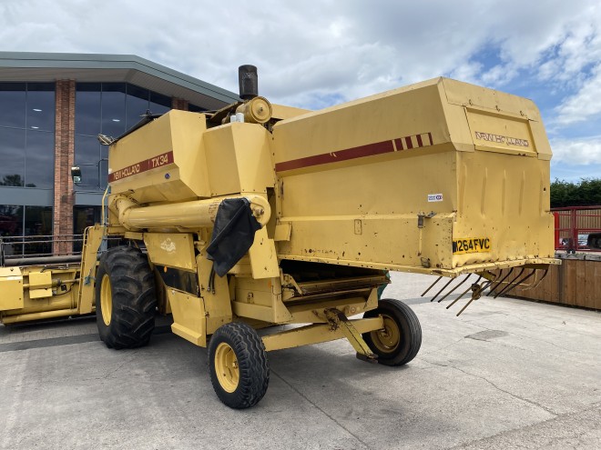 NewHollandTX 34 C/W 20' Header and trailer