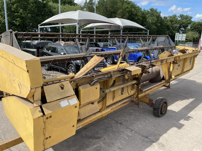 NewHollandTX 34 C/W 20' Header and trailer