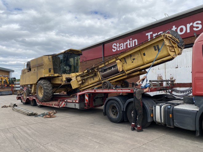 NewHollandTX 34 C/W 20' Header and trailer