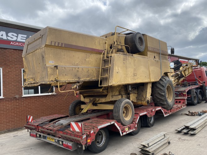NewHollandTX 34 C/W 20' Header and trailer