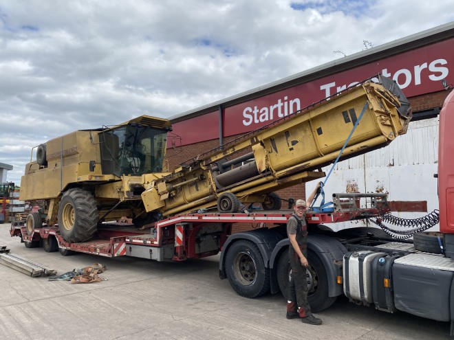 NewHollandTX 34 C/W 20' Header and trailer